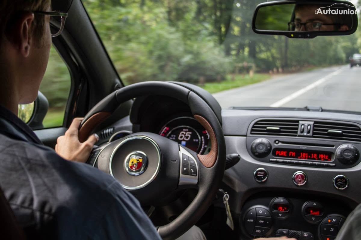 Driver's view from behind the wheel on a country road