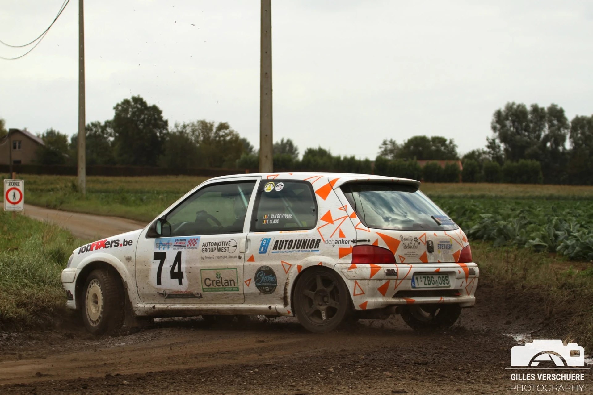 White Peugeot 106 #74 on a muddy track, Monteberg Rally 2020